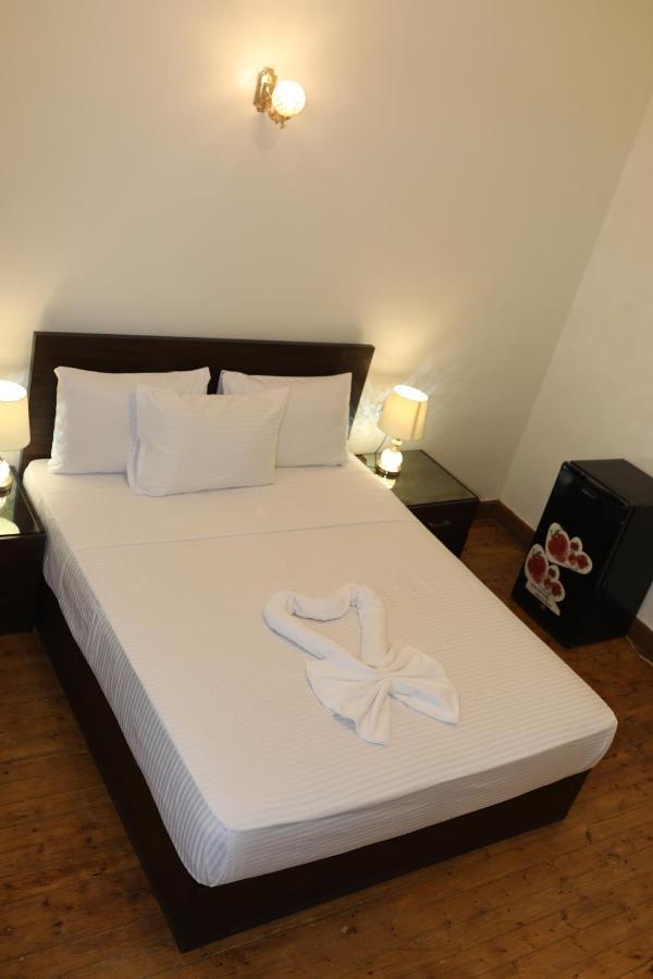 A Pousada New Midtown Cairo Exterior foto